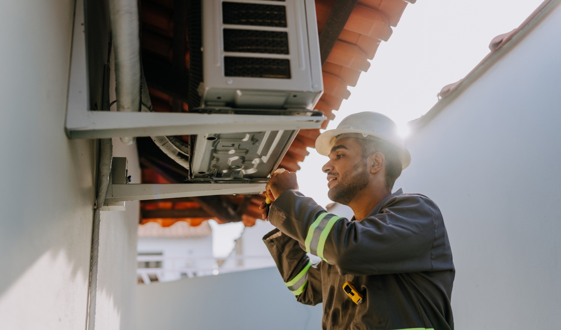 man working on HVAC